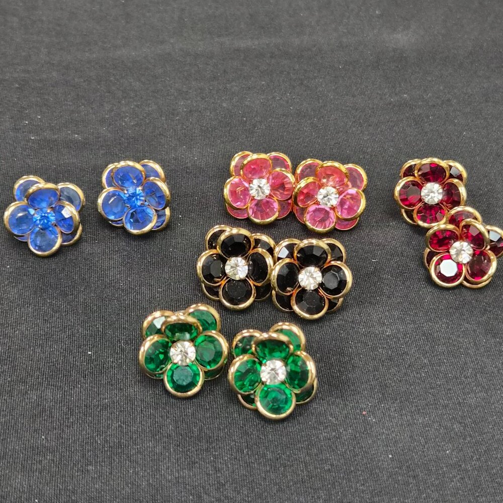 Set of five pairs crystal and gold trim earrings multiple colors center crystal